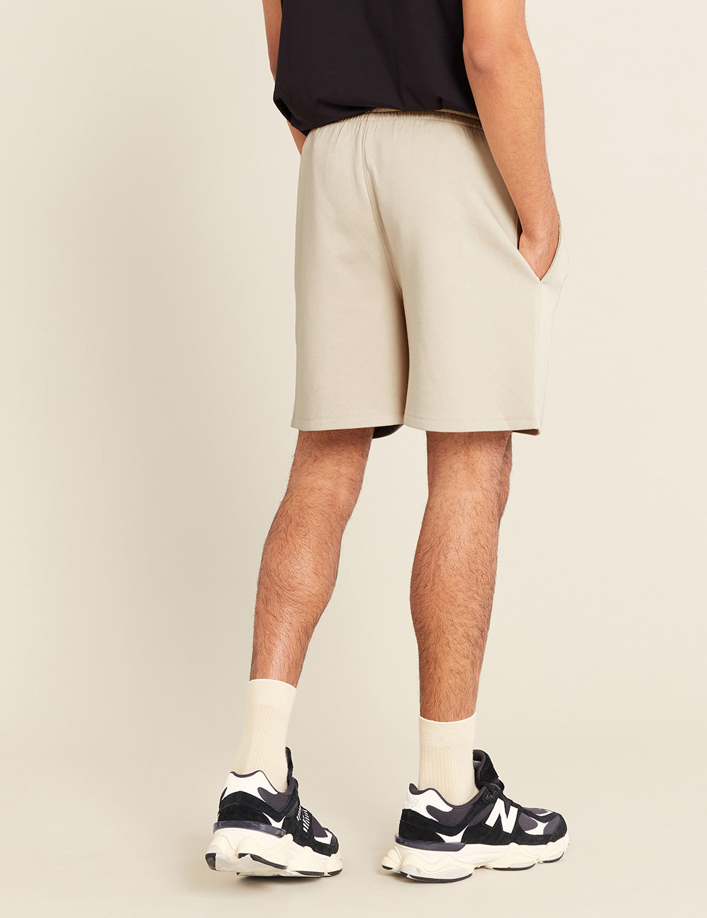 Gender-Neutral-6_-Sweat-Shorts-Sand-Male-Back.jpg