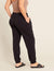 Gender-Neutral-Cuffed-Sweat-Pants-Black-Female-Back.jpg