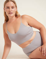 Boody Bamboo Lyocell Ribbed Low Back Bra in Mist Light Grey with matching Underwear seated view