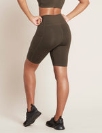 Boody Bamboo Active High-Waisted 8" Short with Pockets in Dark Green Olive Rear View